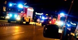 Ambulance and firetruck at night