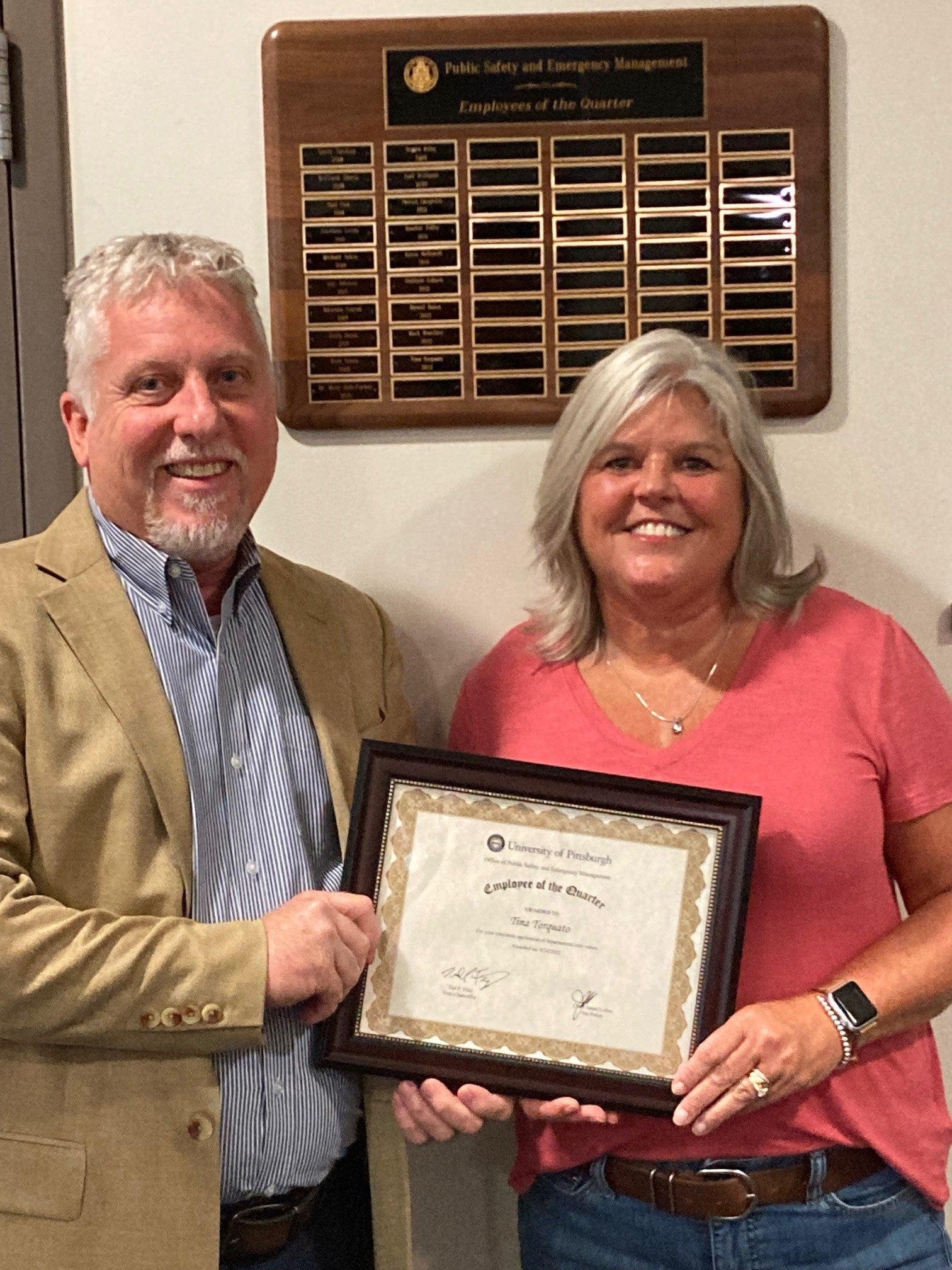Tina Torquato was named Employee of the Quarter. With her is Ted Fritz, the Vice Chancellor of Public Safety and Emergency Management.